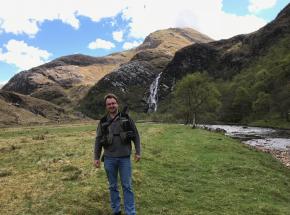 Archie on tour with fishing rod